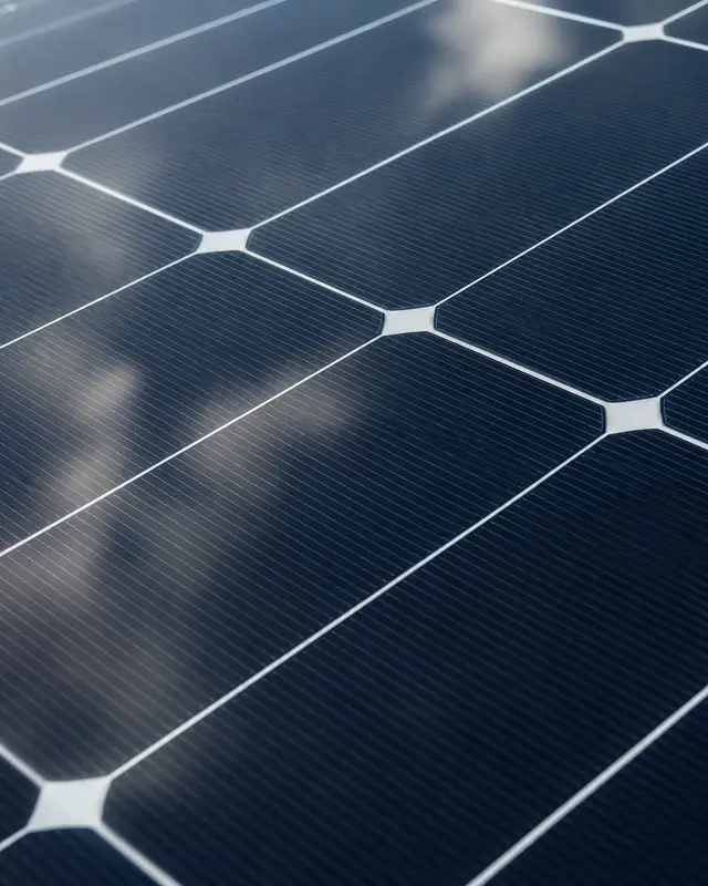 Solar PV panel array fitted across the south-facing pitched roof of an Irish home in daylight