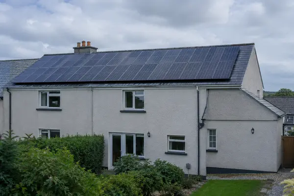 Irish semi-detached house with a full solar PV array across the roof